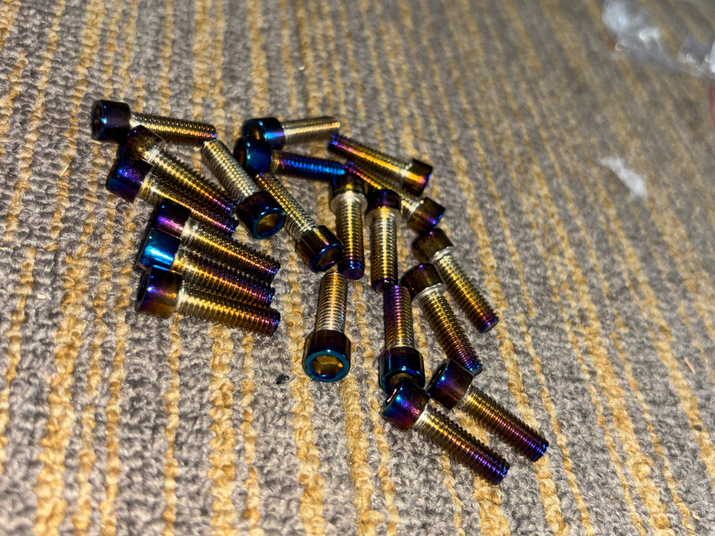 Brake caliper titanium bolts